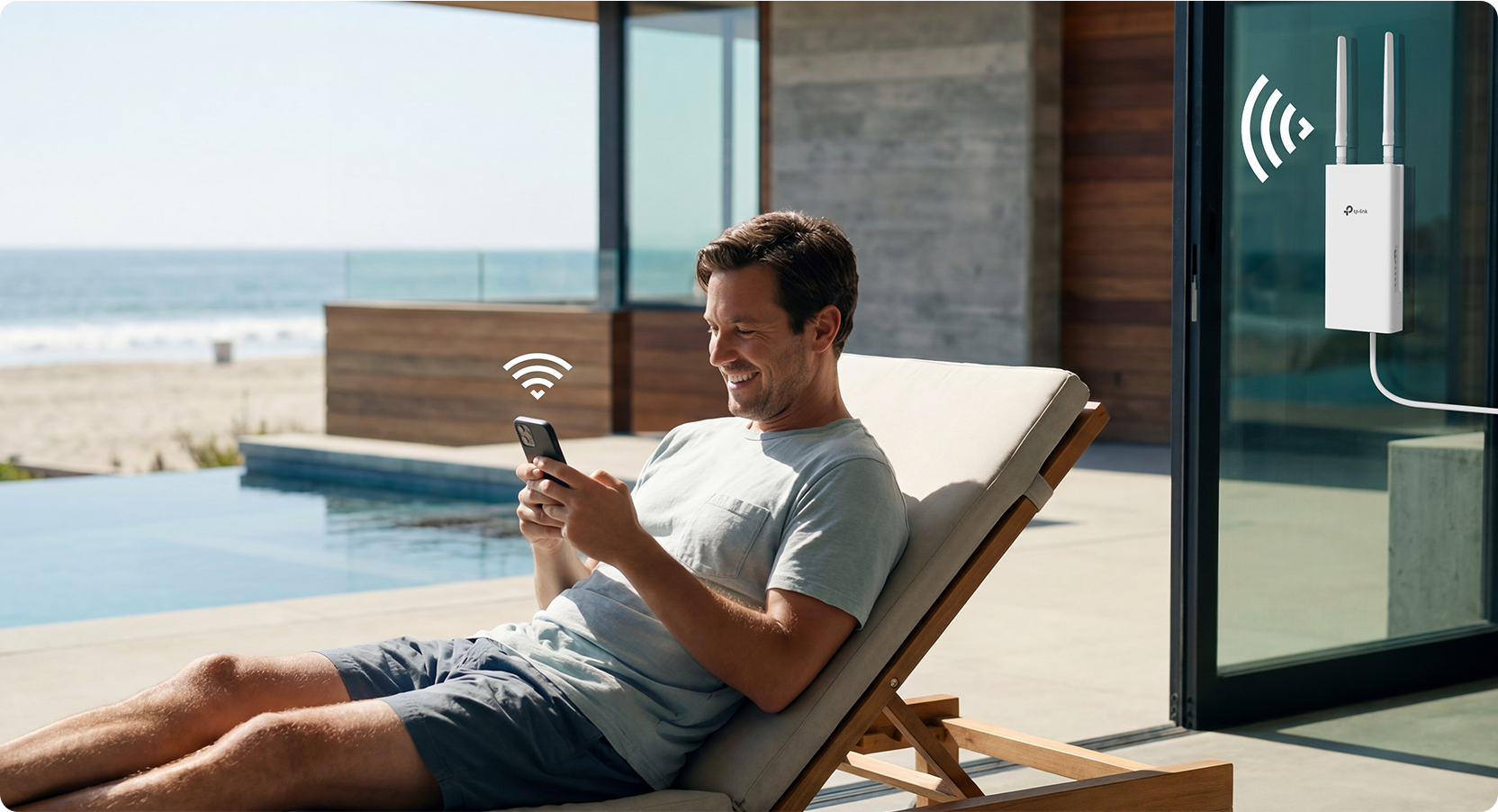Man using a device by a pool outside
