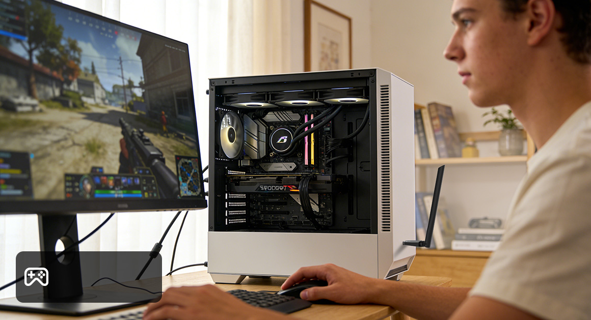 Man playing a video game on his PC