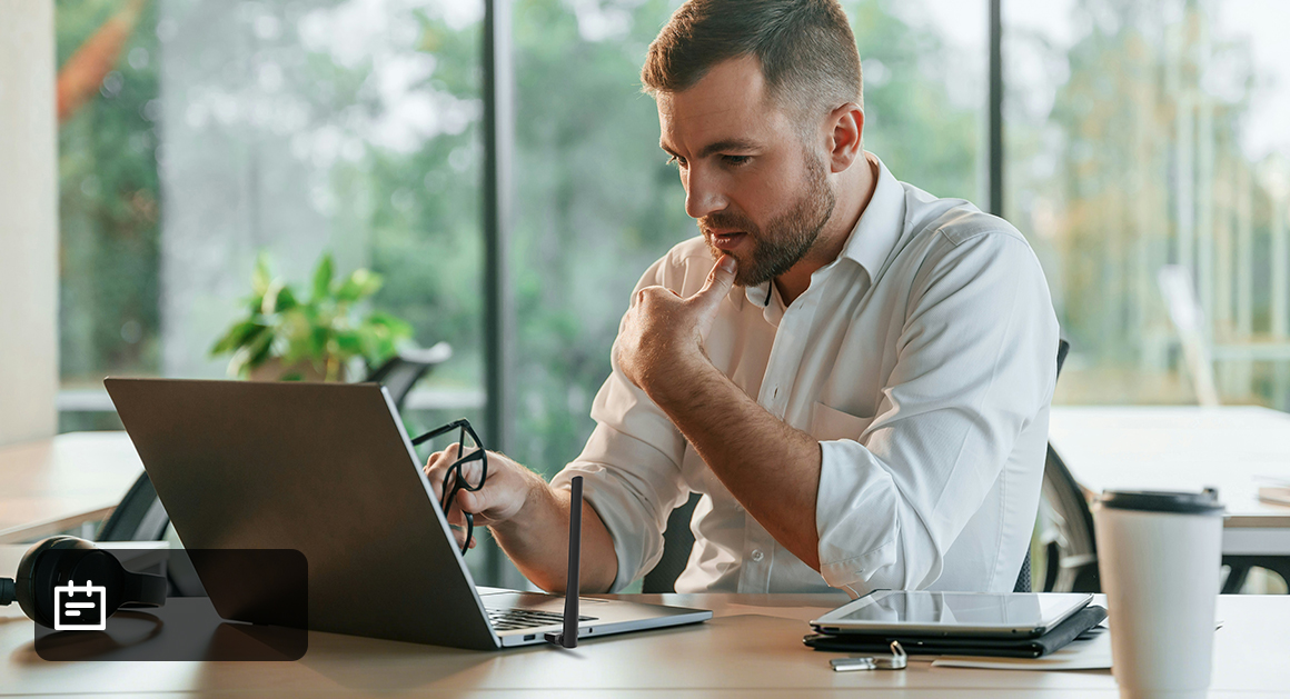 Man playing a video game on his PC