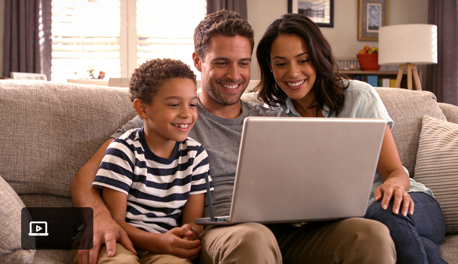 family watching a laptop together