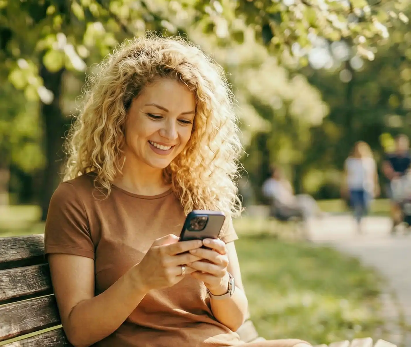mother checking for phone notifications from her child