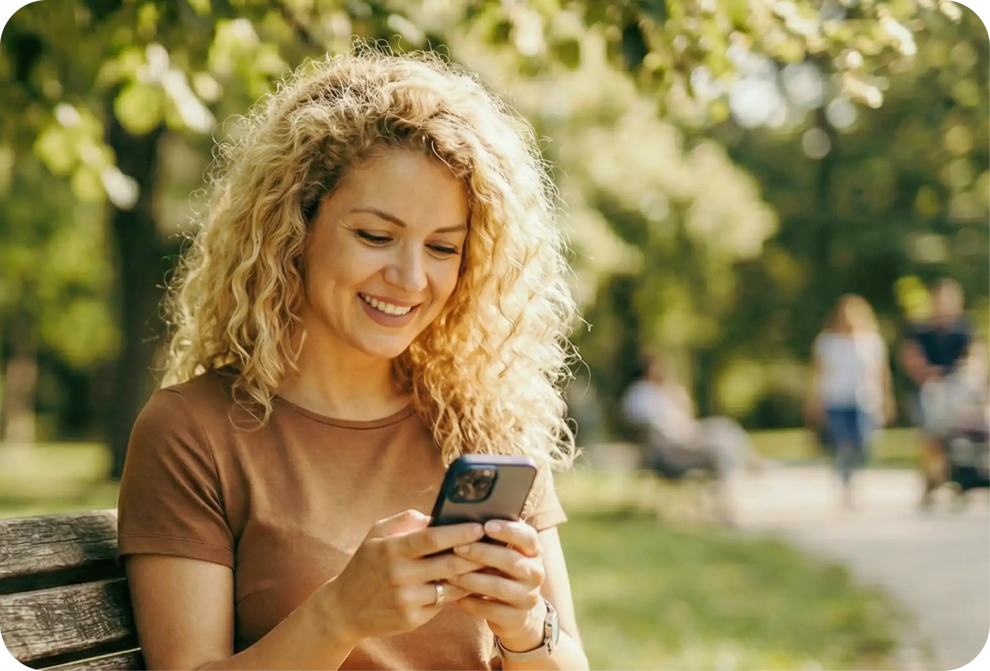 mother checking for phone notifications from her child
