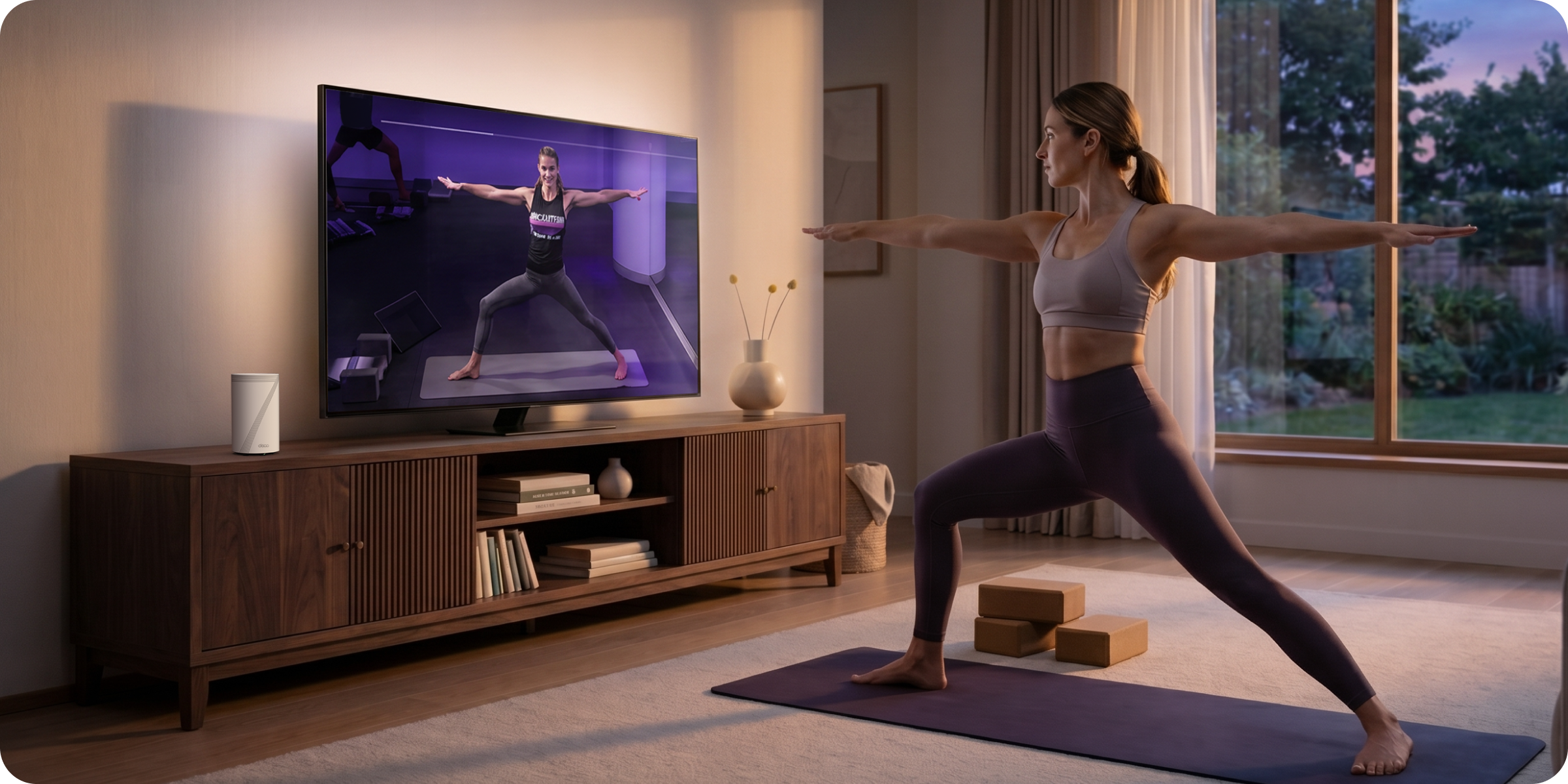 A fit woman exercising with a tv instructor