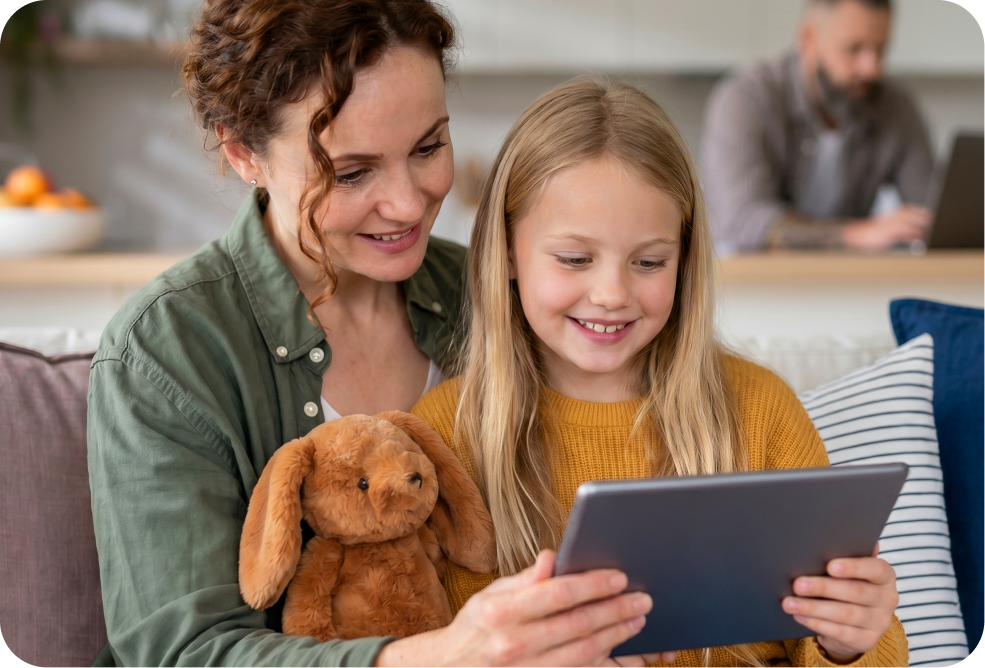 Father and daughter using a tablet
