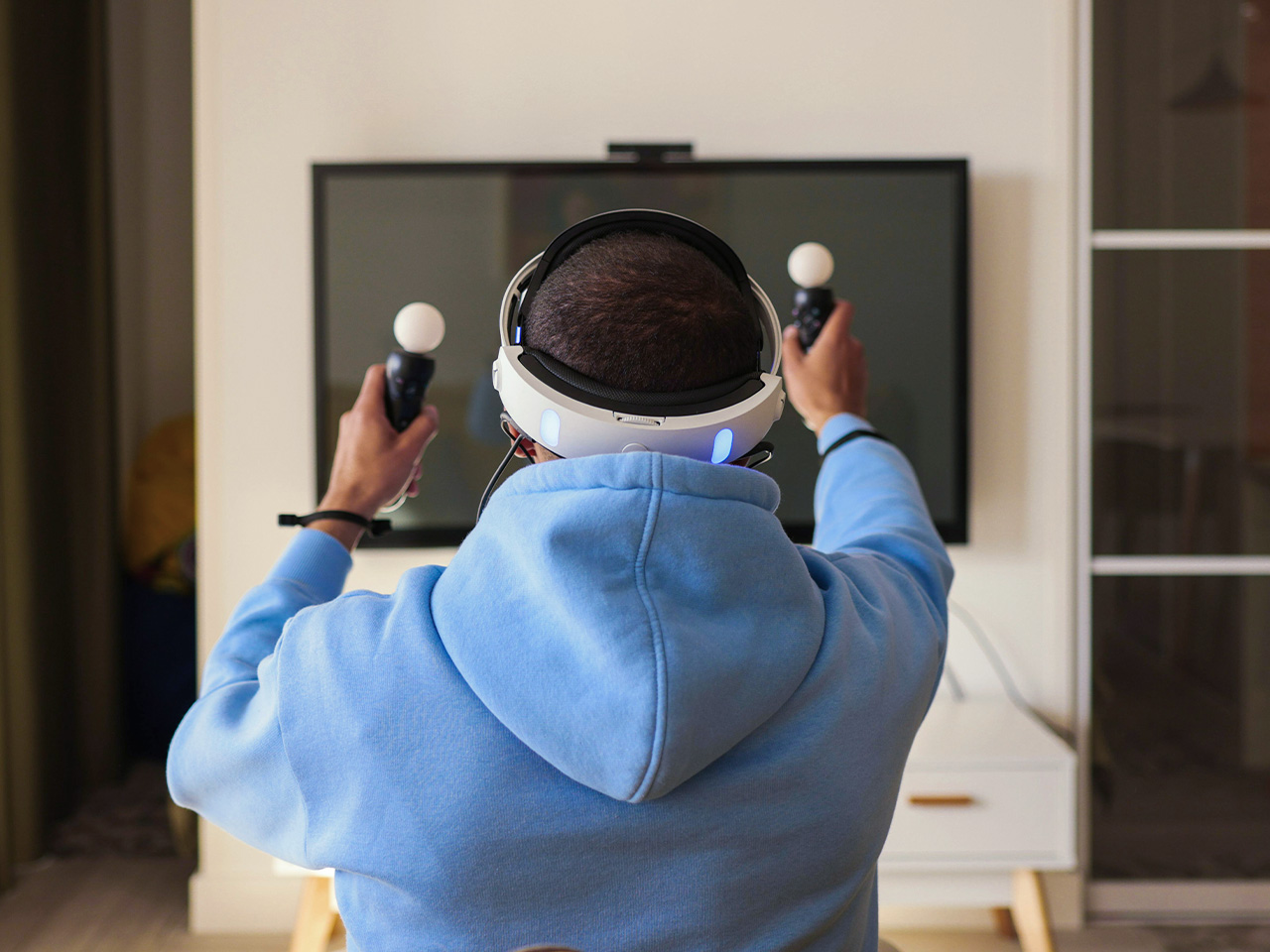 man playing game with a VR headset