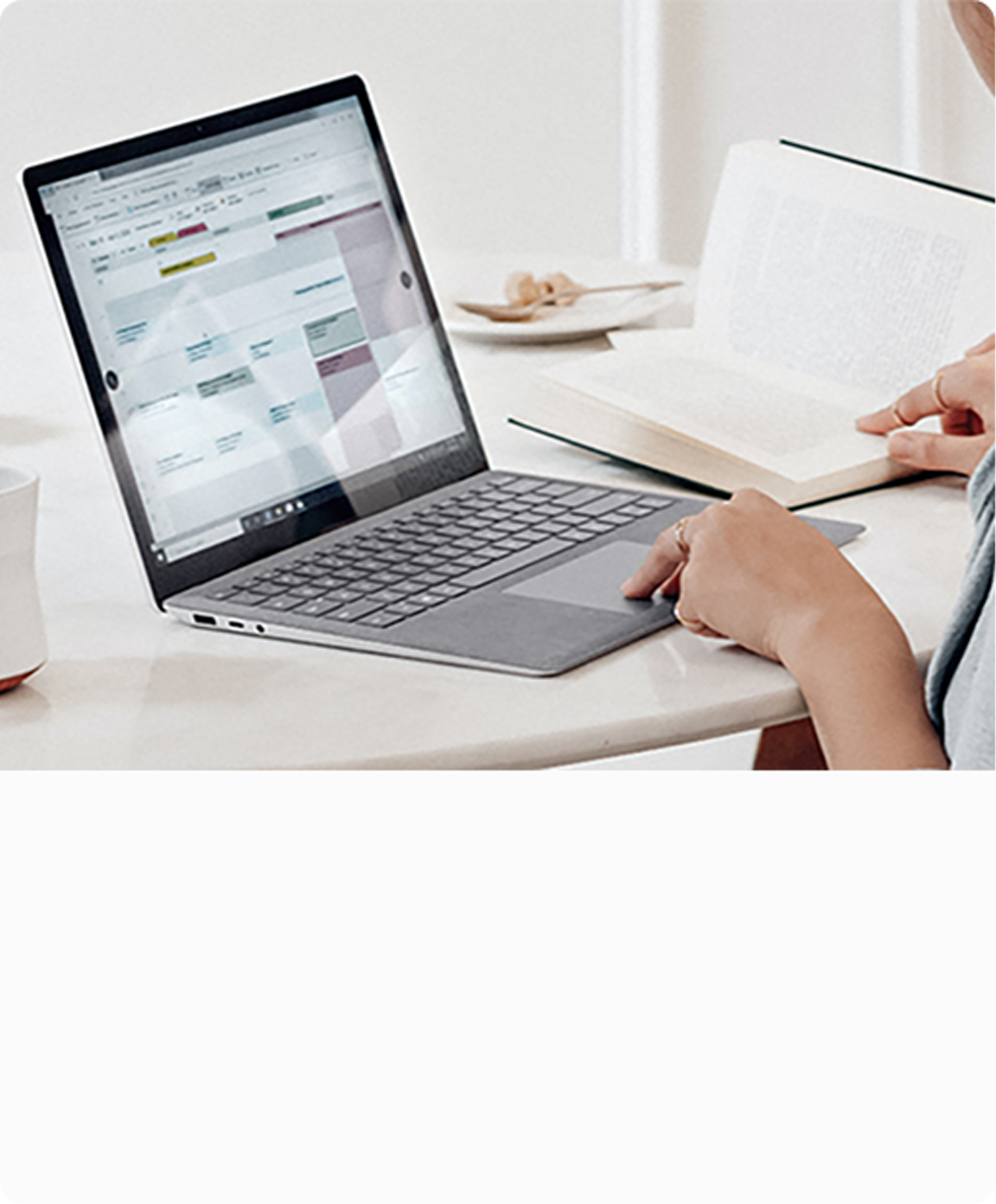 back of a user on a laptop