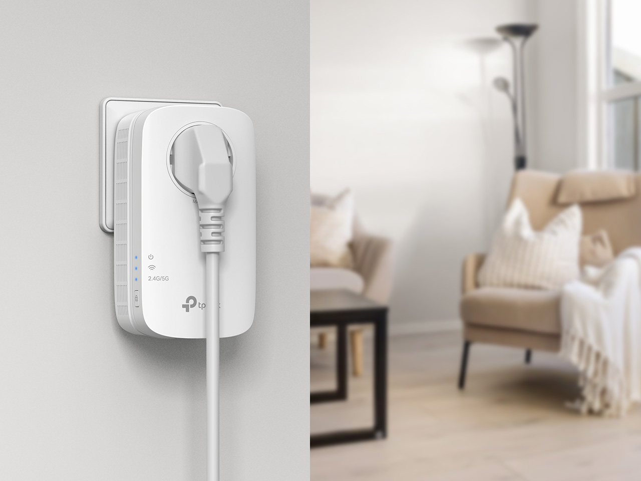 RE600X powering a plug through its passthrough socket beside a furnished living room.