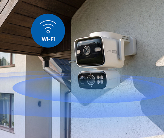 Person talking on the phone while looking at security footage