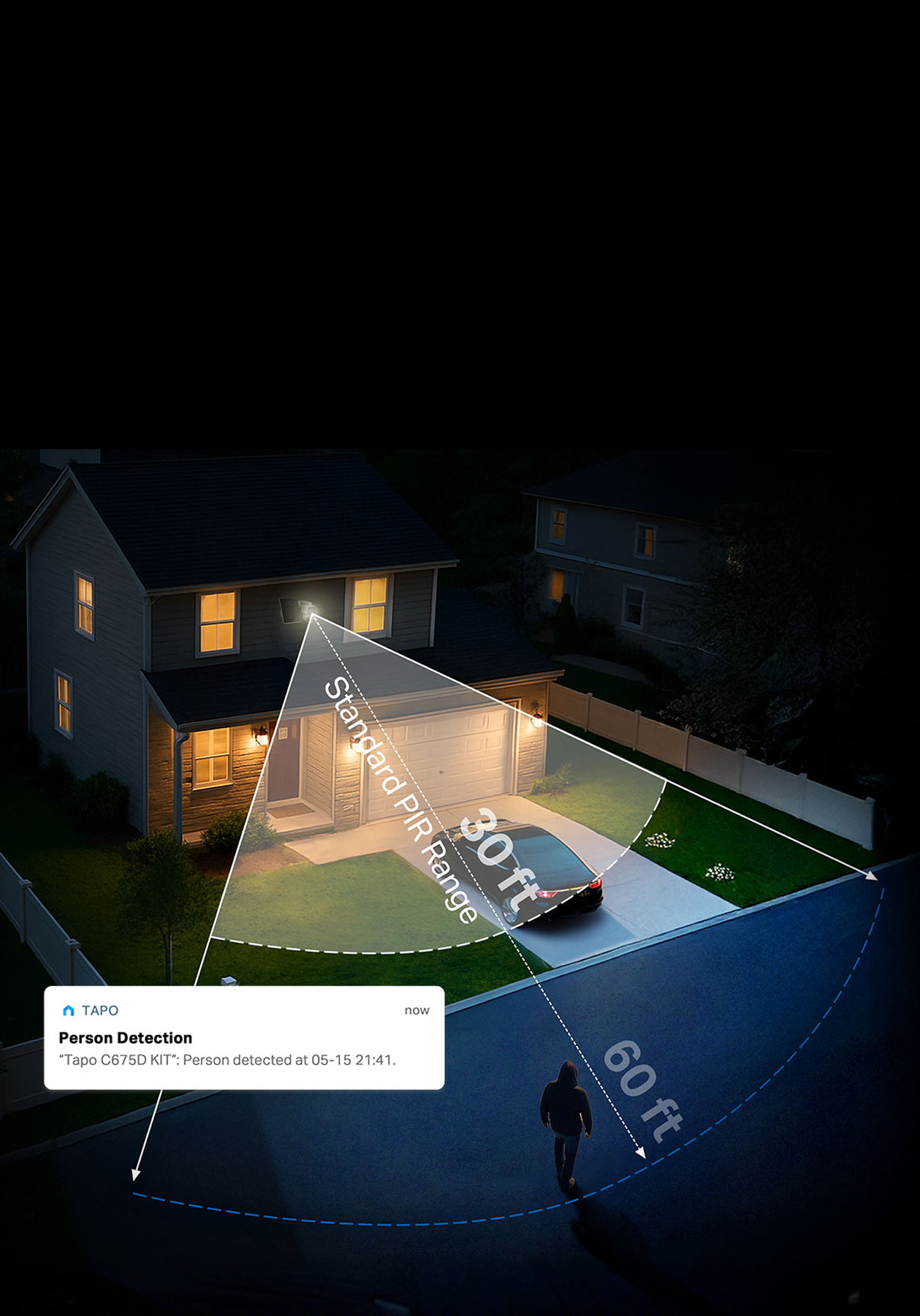 Home driveway lit up at night