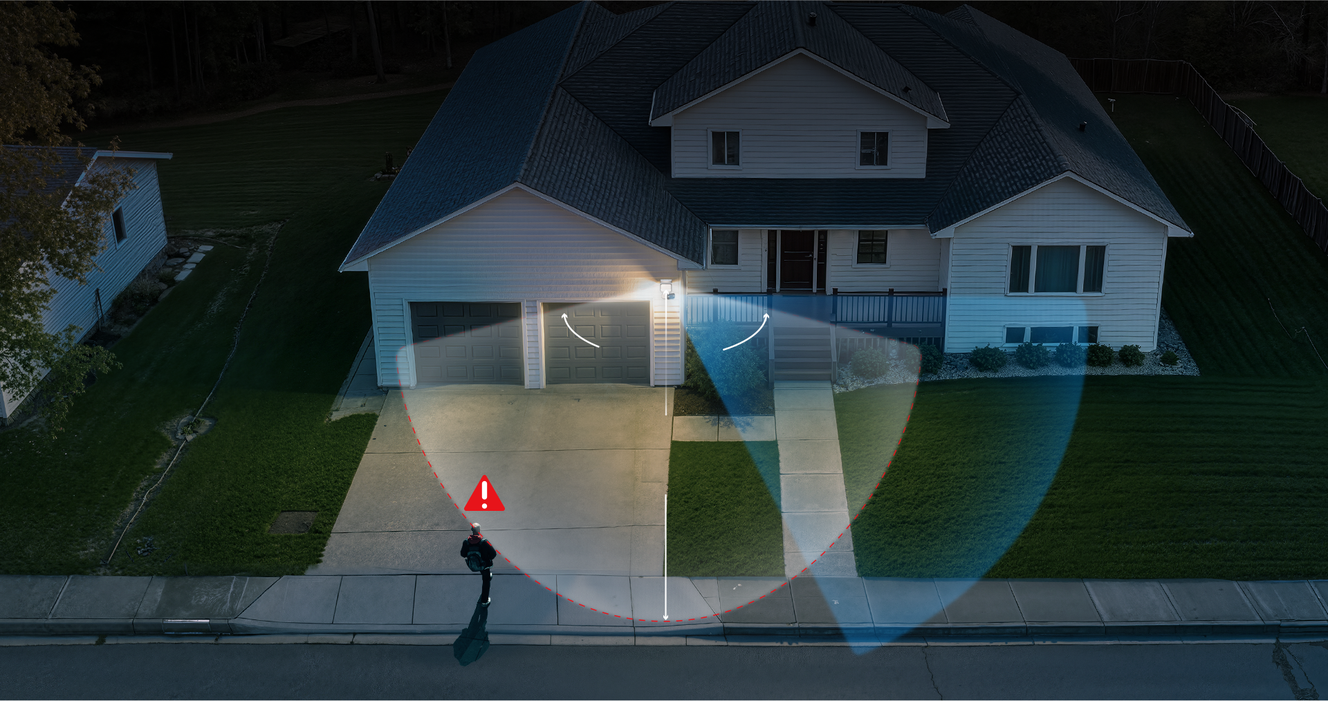 birds-eye view of a man walking onto a house driveway