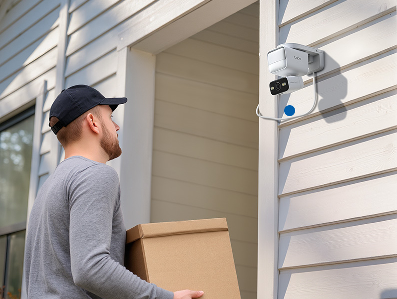 Delivery man holding a package