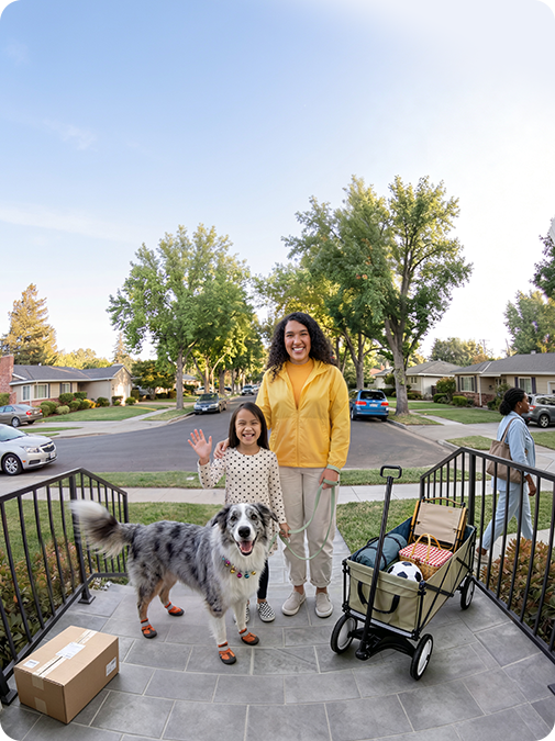 Head-to-toe front porch view with people, pets, and packages