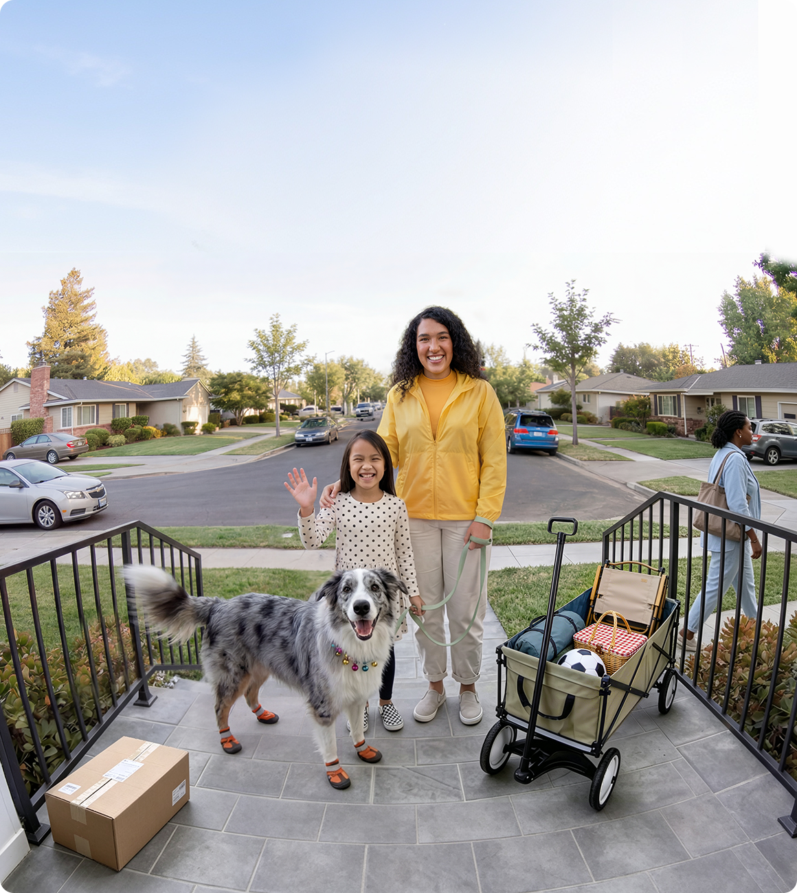 Head-to-toe front porch view with people, pets, and packages