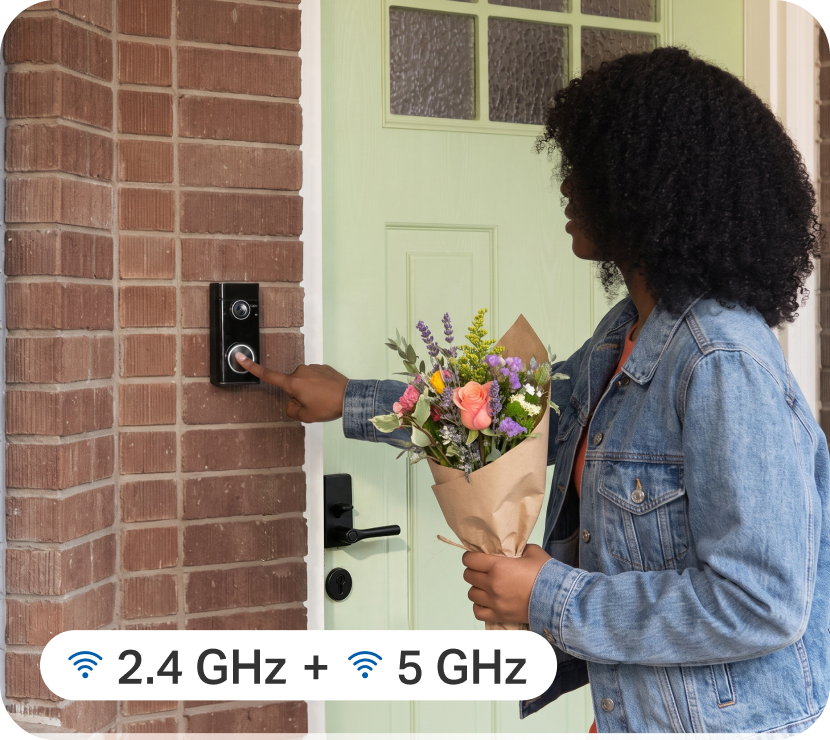 Tapo D260 doorbell beside a visitor with dual-band Wi-Fi
