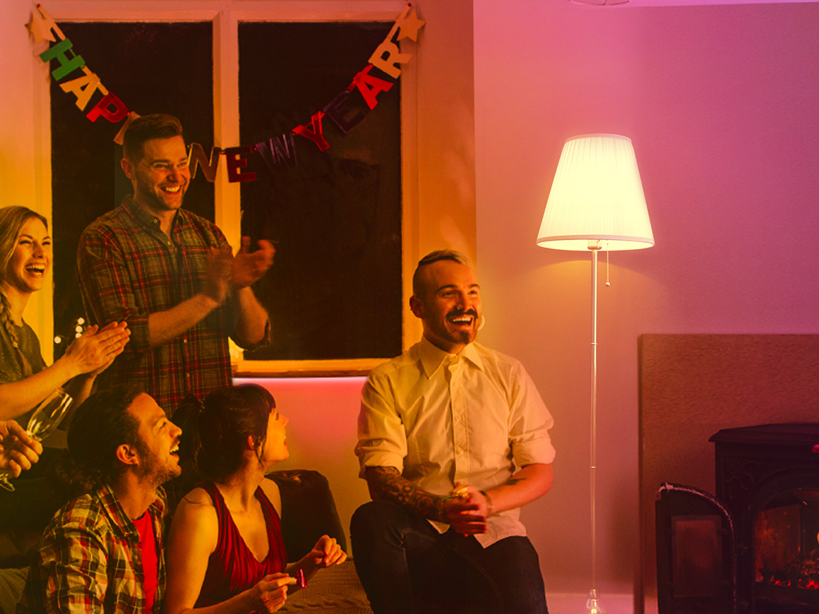 Living room party with colored lighting