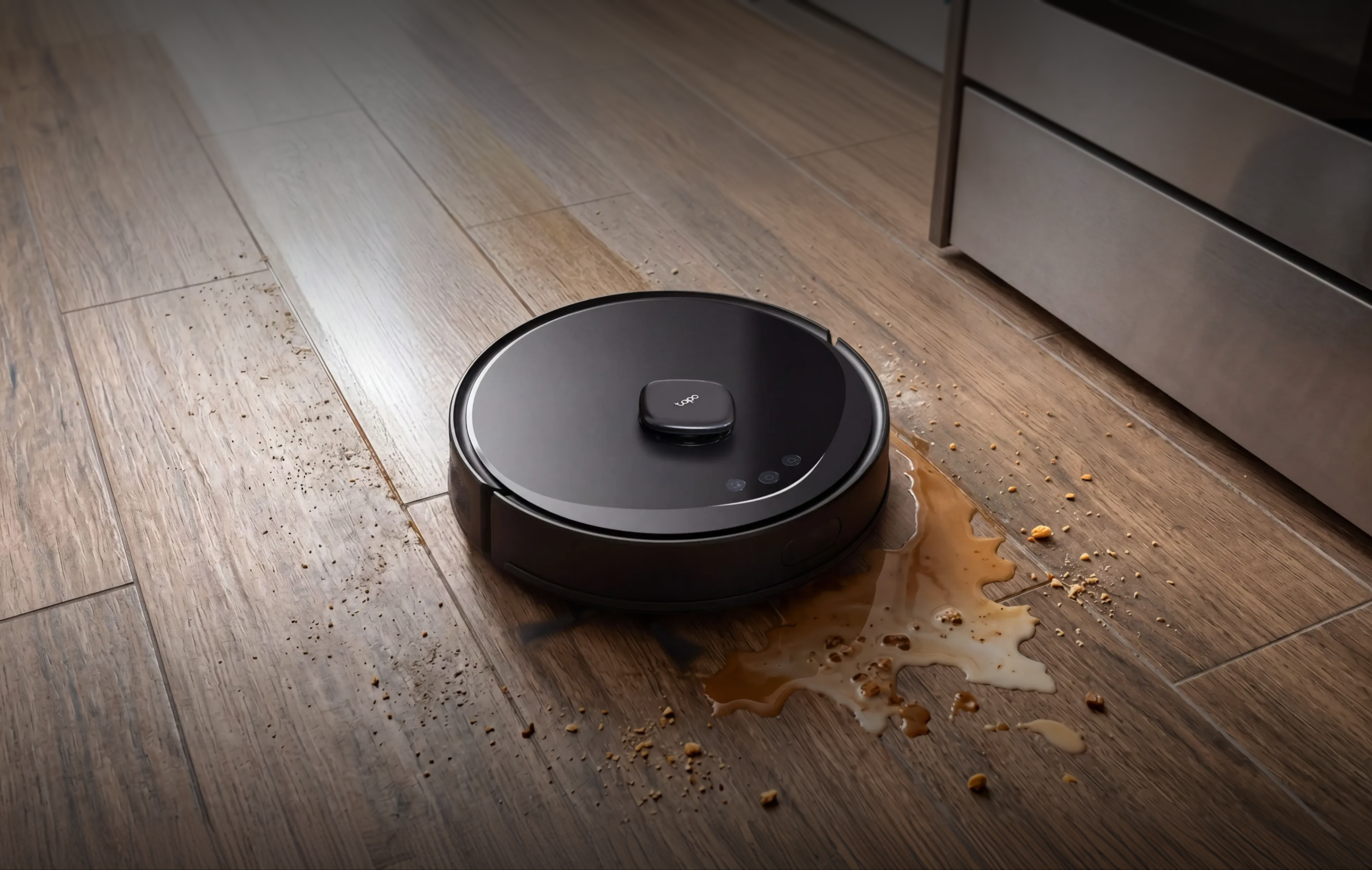 Tapo RV30 Max Plus Gen 2 vacuuming and mopping a spill in one pass